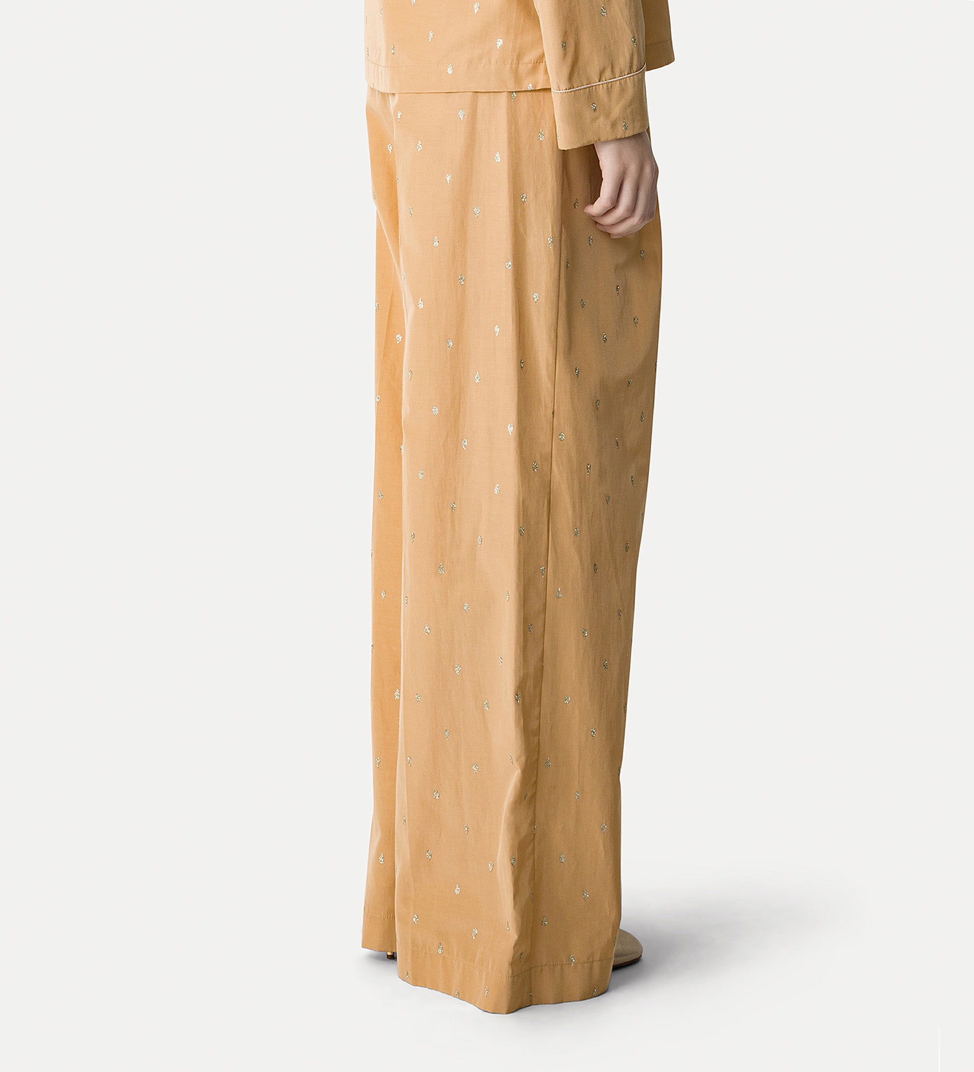 high—waisted glitter trousers yellow gold
