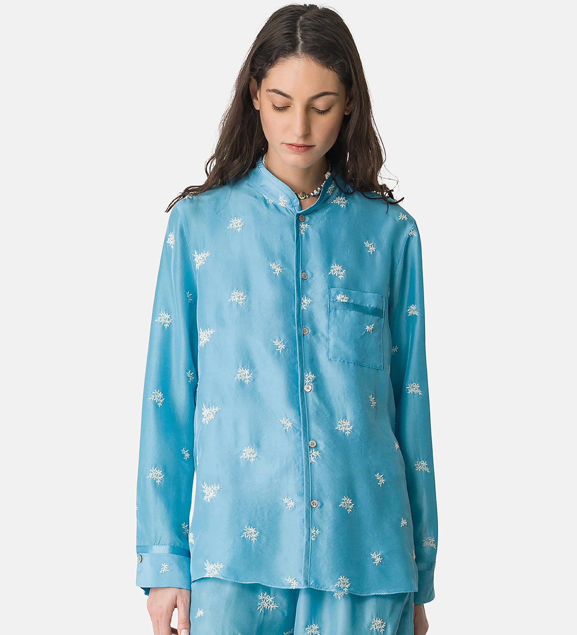 silk shirt with “petites fleurs” embroidery turchino