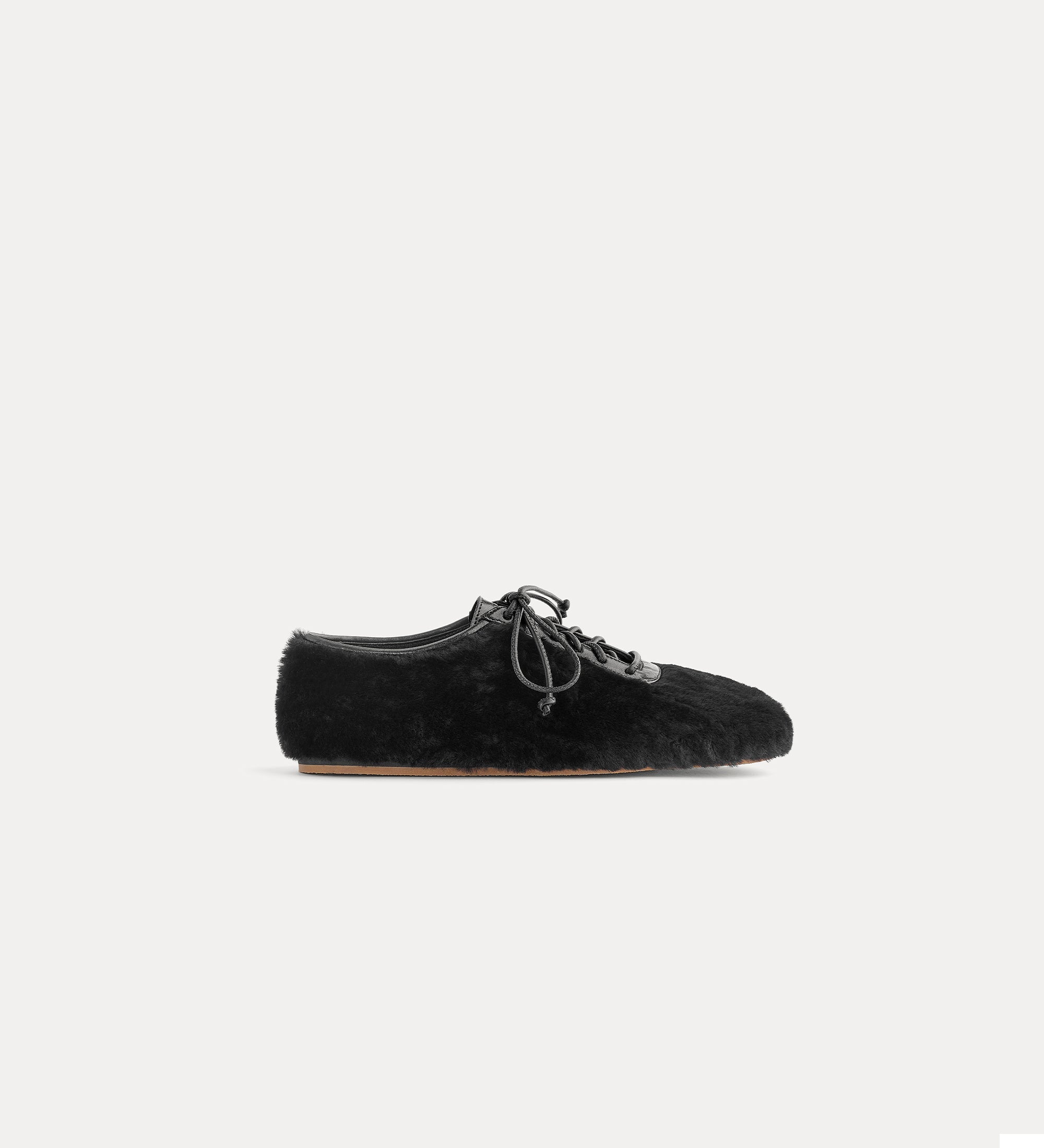 sheepskin lace–up shoes with rubber soles nero