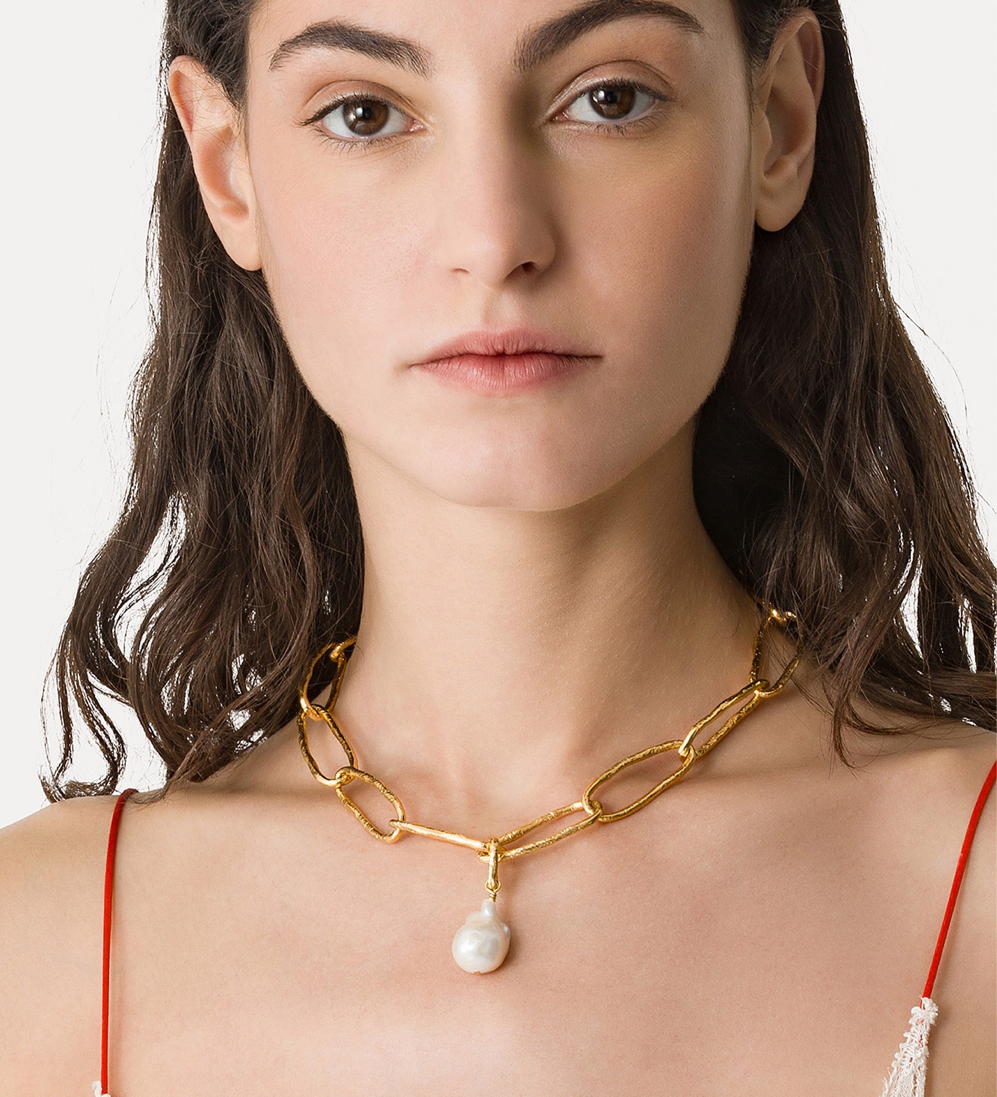 collier scultura con perla oro