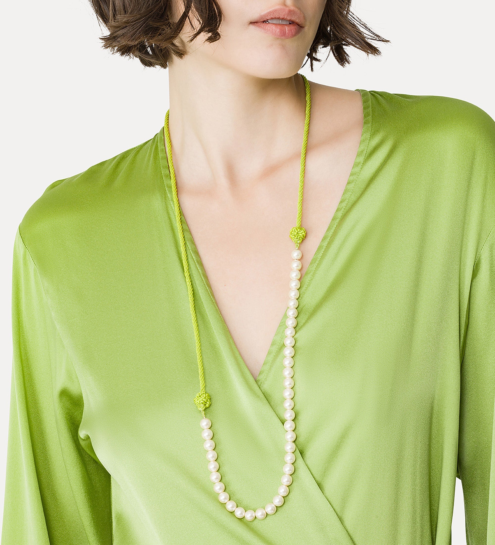 braided cord necklace with glass pearls green