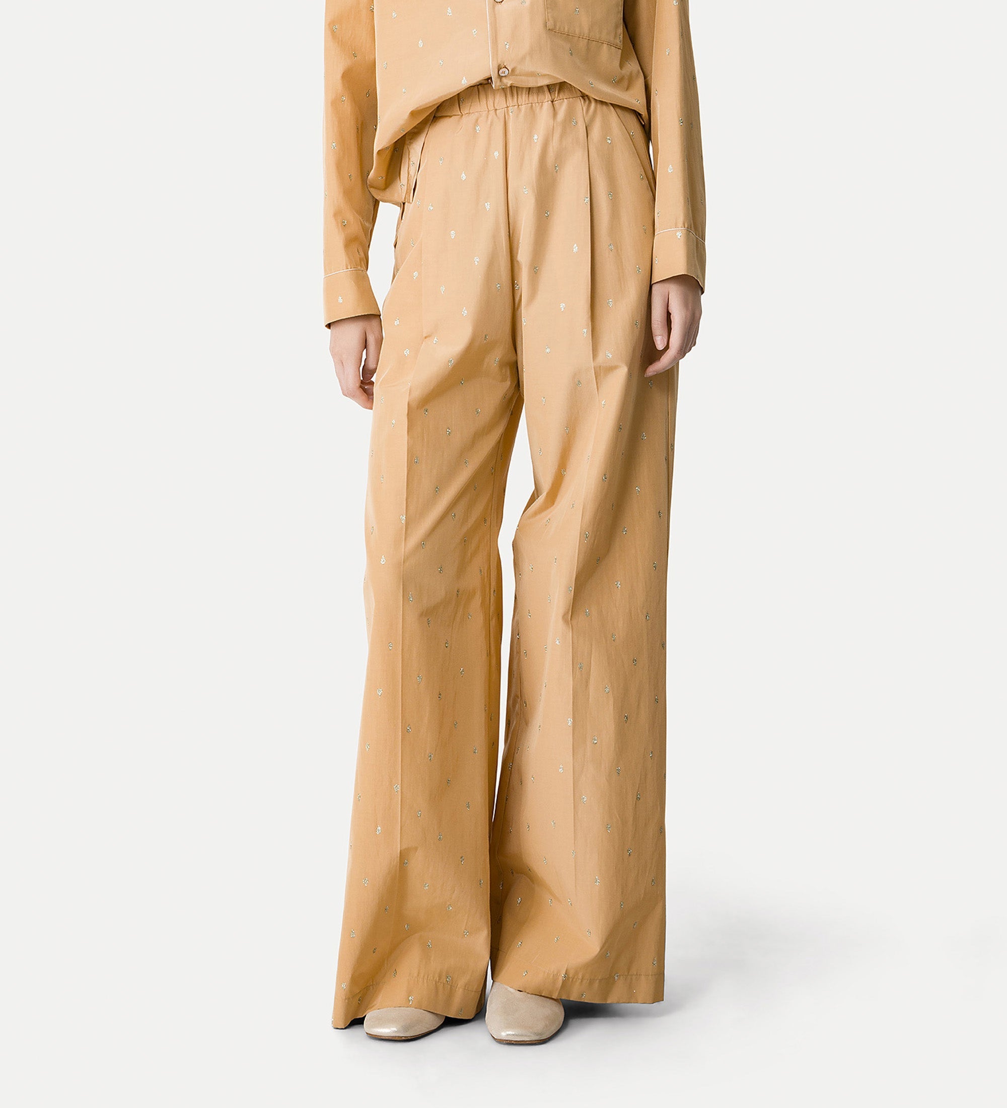 high—waisted glitter trousers yellow gold