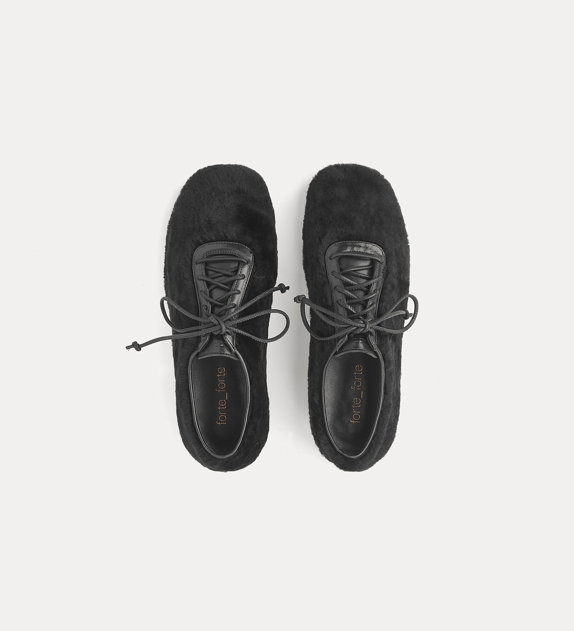 sheepskin lace–up shoes with rubber soles nero