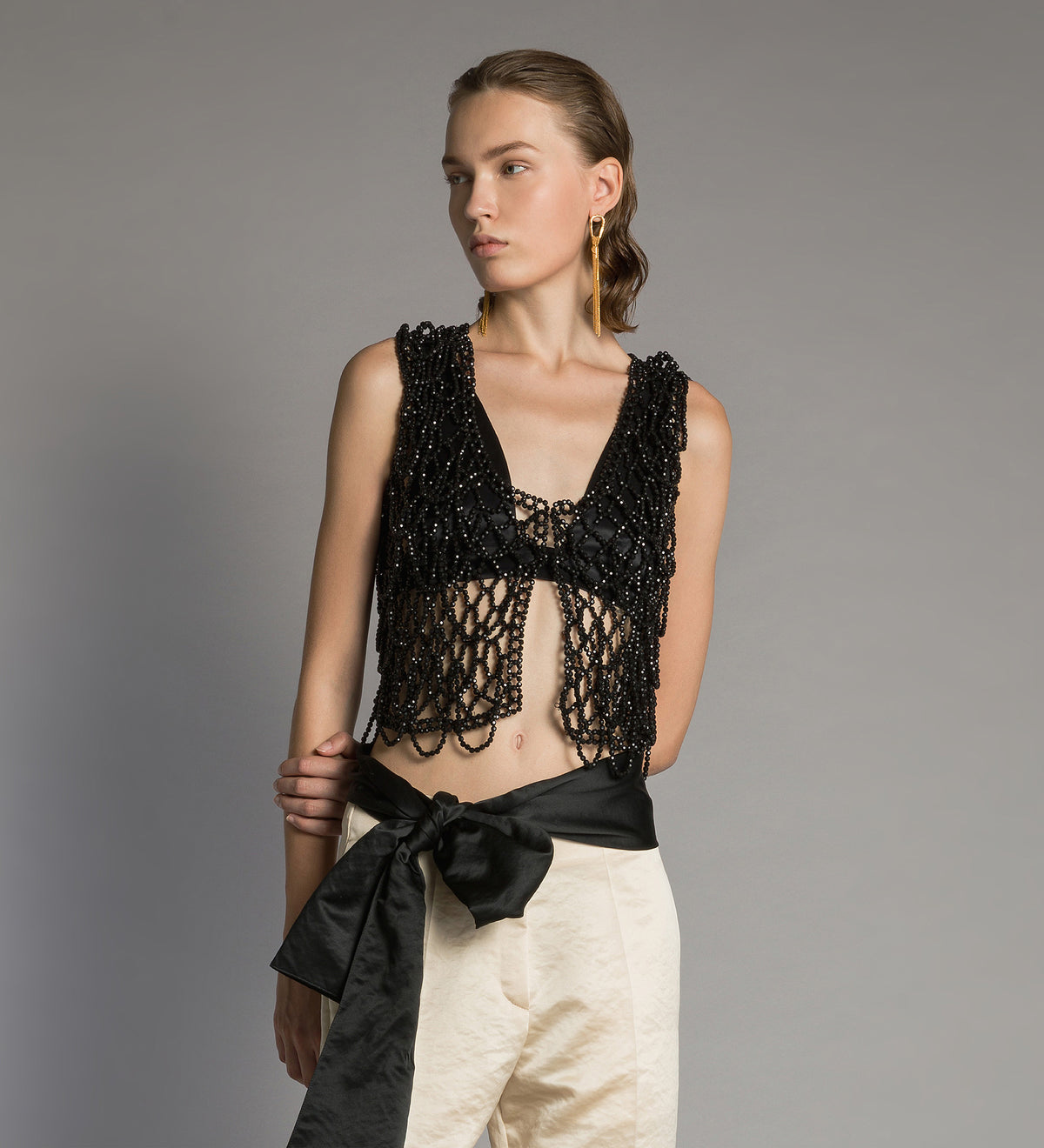 gilet with hand-embroidered “black diamond” pearls black diamond