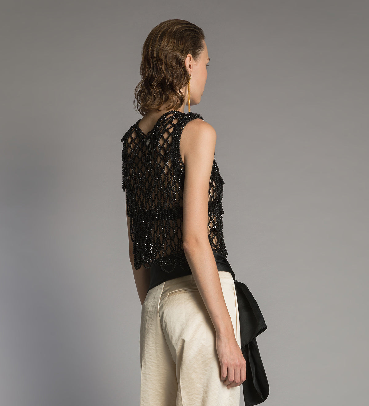 gilet with hand-embroidered “black diamond” pearls black diamond
