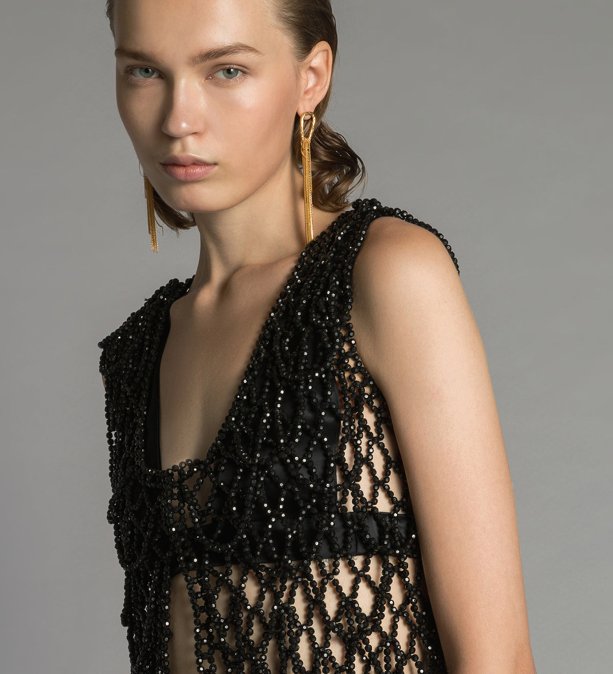 gilet with hand-embroidered “black diamond” pearls black diamond
